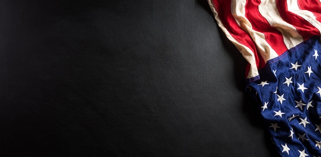 Happy memorial day concept made from american flag on black wooden background