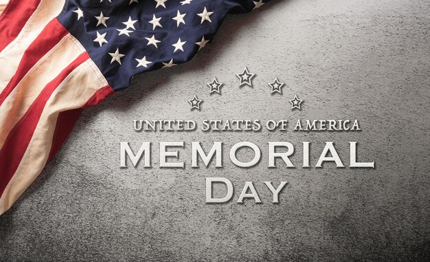 Photo happy memorial day concept made from american flag and the text on dark stone background