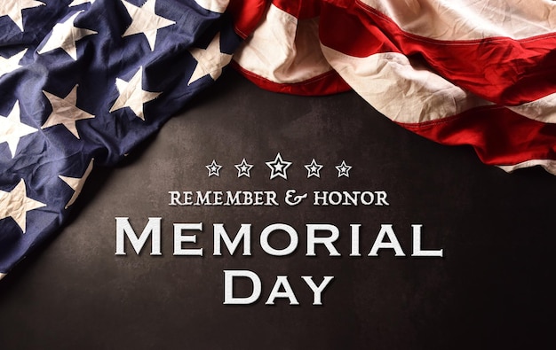 Happy memorial day concept made from American flag with the text on dark stone background