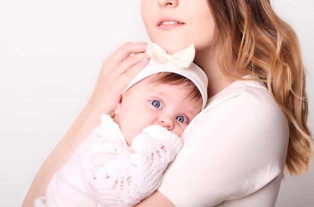 Happy mother and baby laughing   