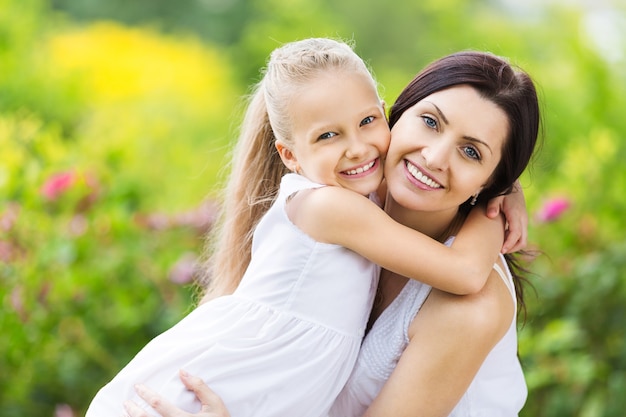 Happy Mother and daughter hugging