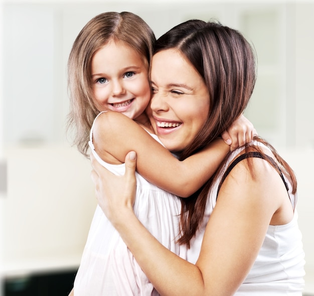 Happy Mother and daughter hugging