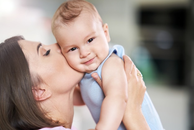 Happy Mother and her Newborn Baby