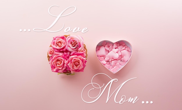 Happy mother's day and love decoration background concept made from hearts and rose on pastel pink background