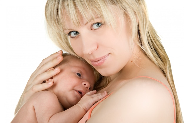 Happy mother with her  baby boy isolated on a white