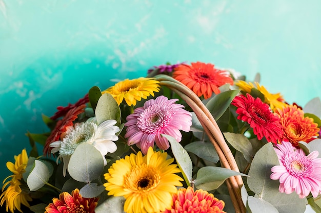 Happy Mothers day greeting card with Beautiful bright flowers bunch at blue backgroundLarge beautiful bouquet of chrysanthemums gerberasHoliday postcard