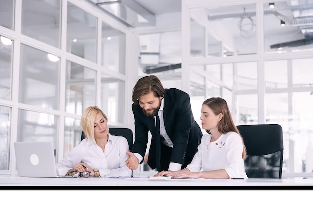 Happy motivated diverse business people work together collaborate in an office meeting colleagues discuss financial project ideas in a boardroom briefing