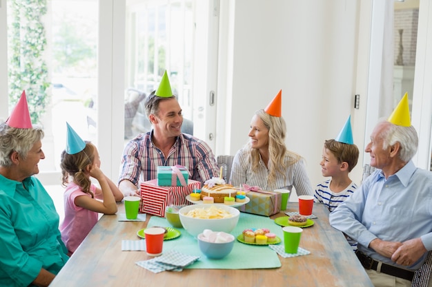 Happy multi- generation family celebrating a birthday