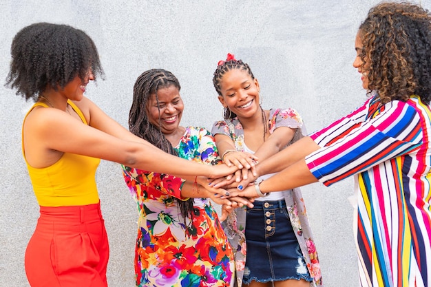 Happy multiracial youths celebrating a party together outside