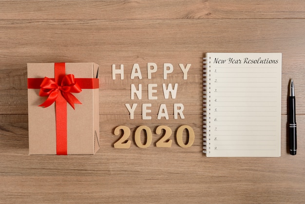 HAPPY NEW YEAR 2020 Wood and New Year's Resolutions List written 