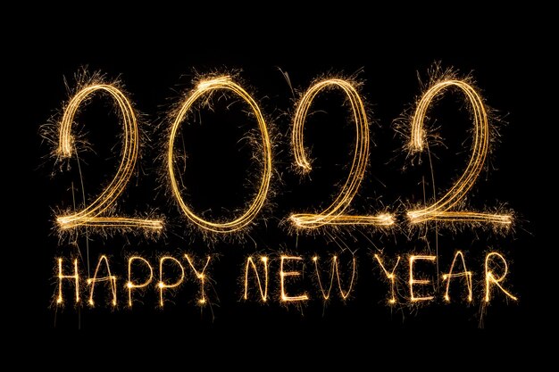 Happy New Year 2022 Sparkling burning text Happy New Year 2022 isolated on black background