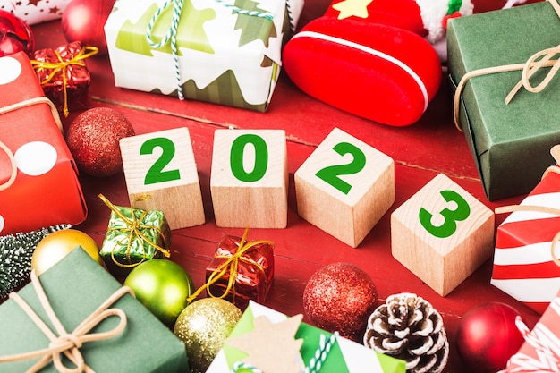 Happy New Year 2023, Christmas 2023, Christmas gifts placed in a festive atmosphere