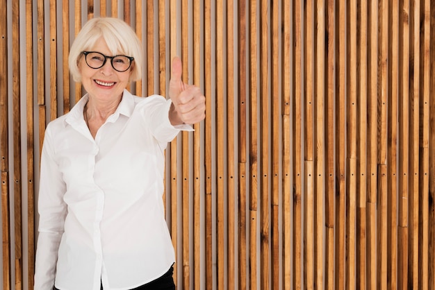 Happy old woman with eyeglasses