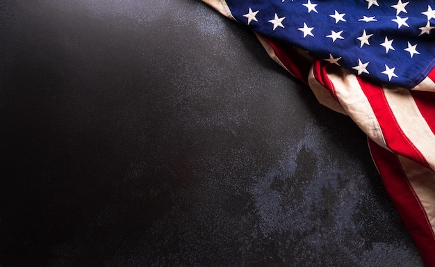 Happy Presidents day concept made from American flag on dark stone background