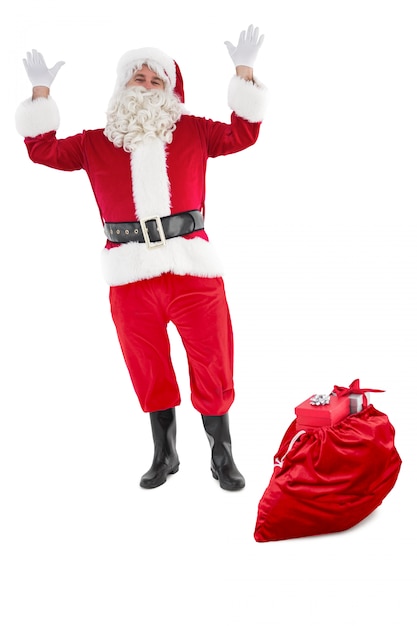 Photo happy santa claus with sack full of gifts