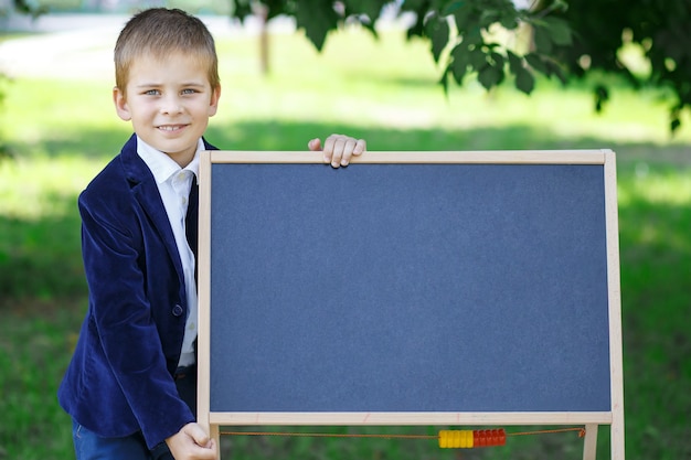 happy schoolboy Back to school Boy with a board Back to school