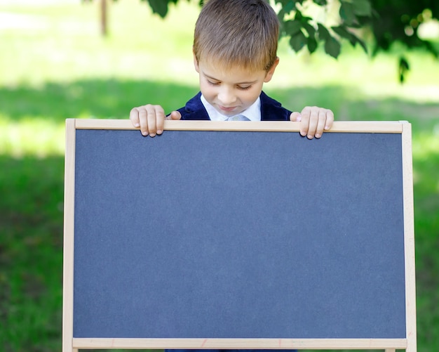 happy schoolboy Back to school Boy with a board Back to school