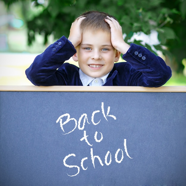 happy schoolboy Back to school Boy with a board Back to school