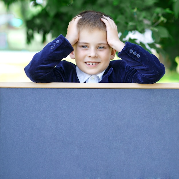 happy schoolboy Back to school Boy with a board Back to school