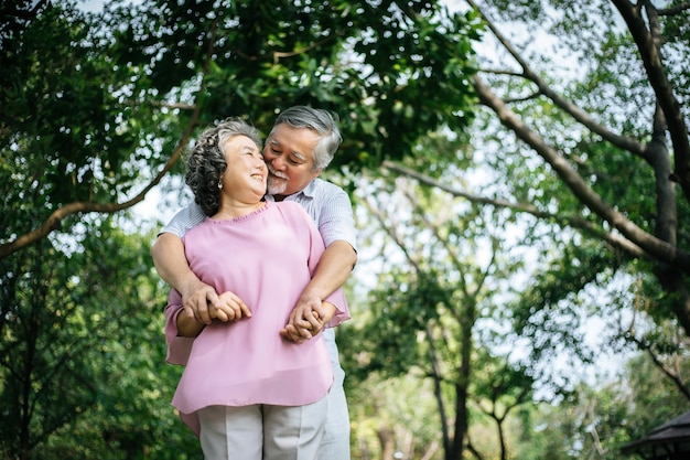 Happy senior couple in the park