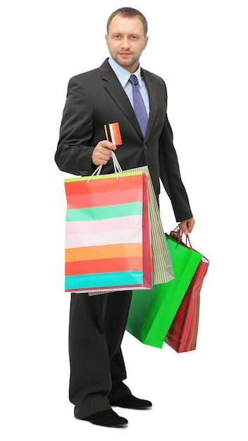 Happy shopping man. Isolated over white background