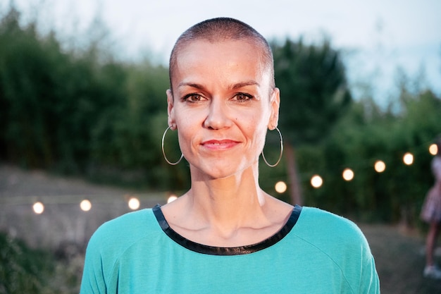 Happy short hair woman Looking at Camera Close Up Portrait of adult woman laughing and smiling