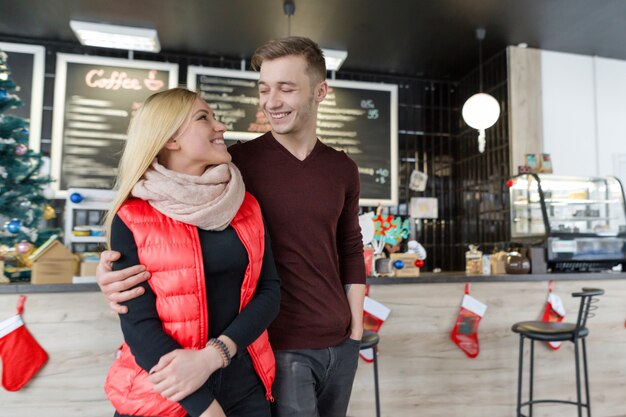 Happy smiling couple. Christmas holidays, love and relationships