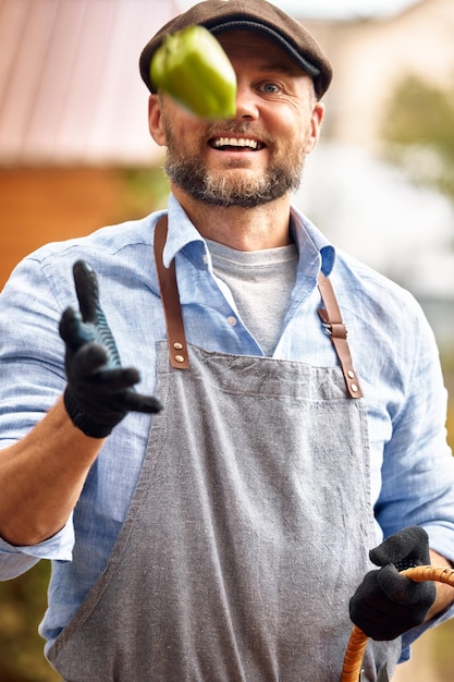 Happy and smiling male farmer after harvest