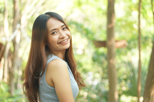 Happy smiling woman in coffee cafe