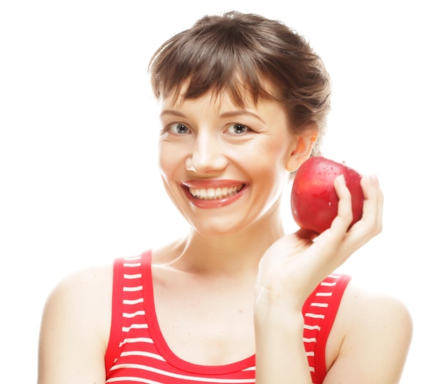 Happy smiling woman with red apple