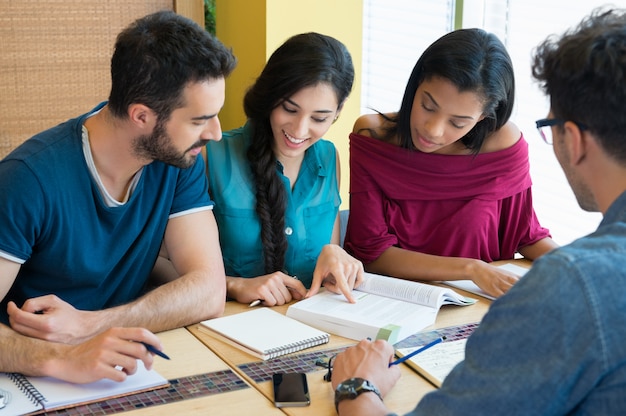 Happy students studying