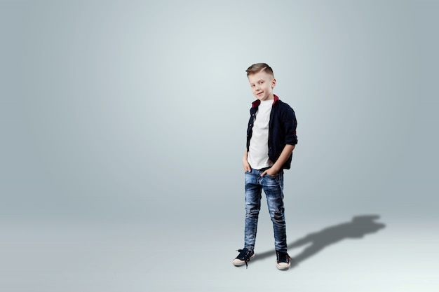 Happy teen boy studio portrait on white background