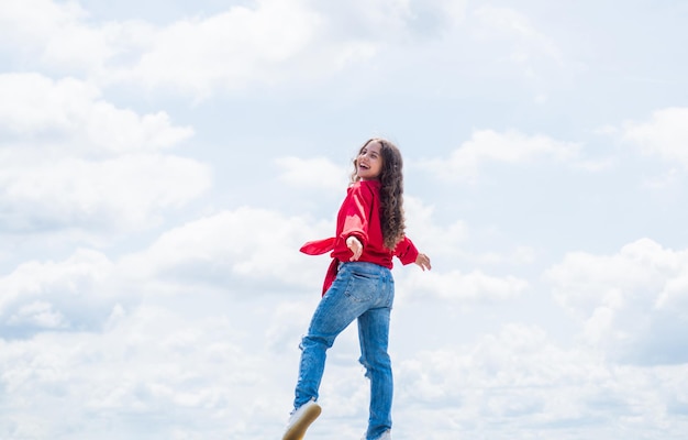 Happy teen girl enjoy good spring weather, childhood happiness.