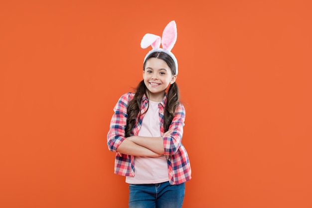 Happy teen girl in funny bunny ears for easter holiday happy easter