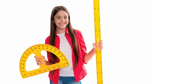 Photo happy teen girl hold protractor ruler study math at school isolated on white education banner of schoolgirl student school child pupil portrait with copy space