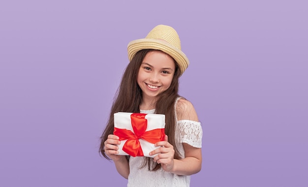 Happy teen girl with gift