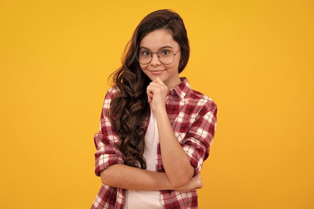 Happy teenager positive and smiling emotions of teen girl Pretty teenage girl in studio Child girl portrait