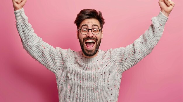 Photo happy and thrilled young man in a blue shirt