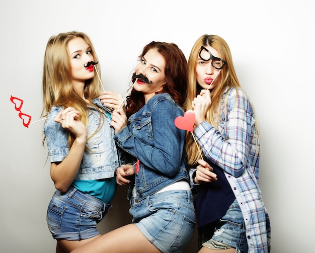 Happy time. Stylish sexy hipster girls best friends ready for party.