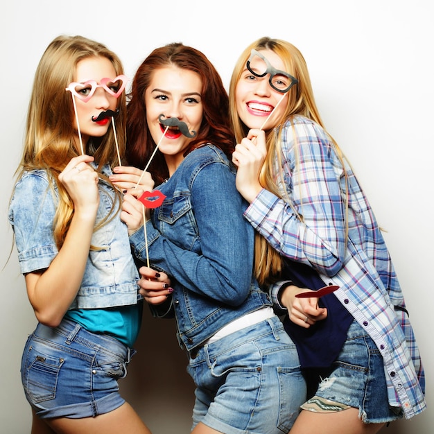 Happy time Stylish sexy hipster girls best friends ready for party