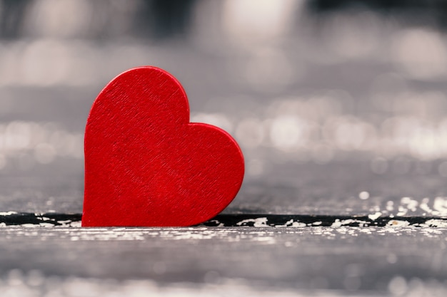 Happy Valentine's day hearts on wooden table. Valentine card