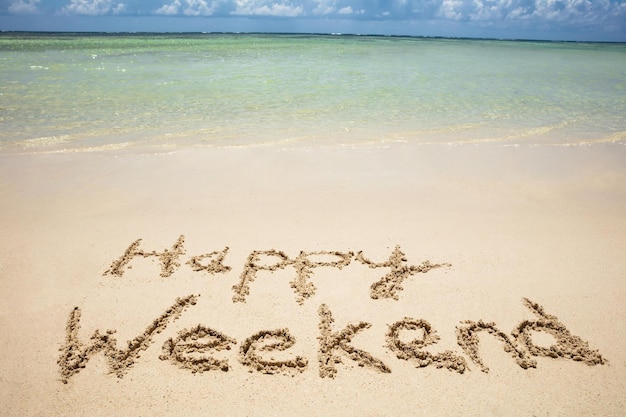 Happy Weekend Text In Sand On Beach