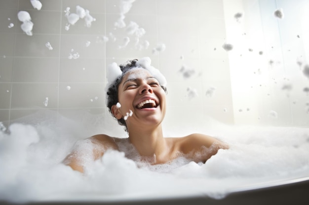 Happy woman in a bubble bath surrounded by foam enjoying her beauty routine