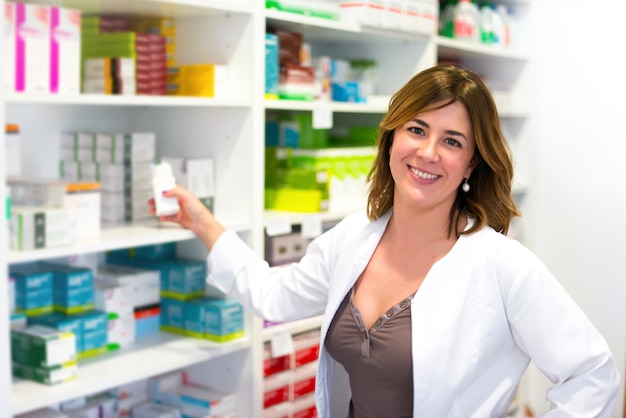 Happy woman customer in the pharmacy