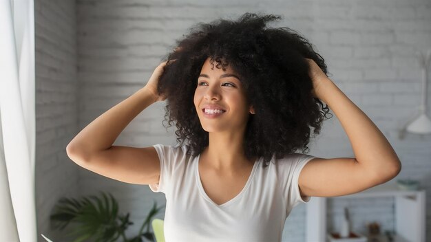 Happy woman drying her hair