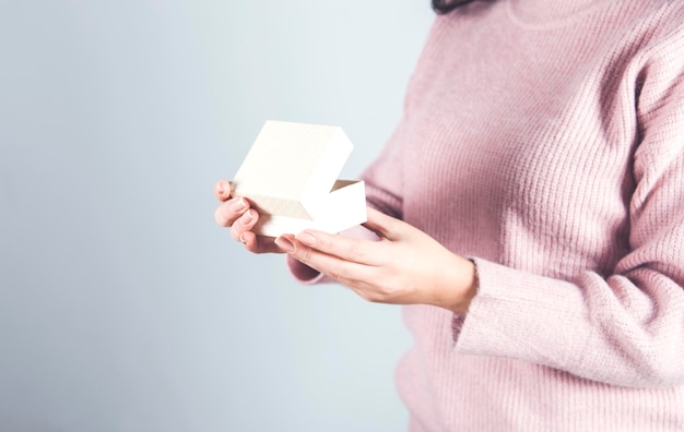 Happy woman hand box