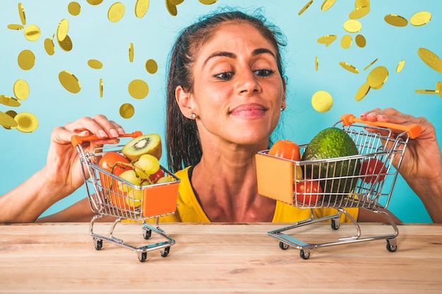 Happy woman made a cheap and healthy shopping of fruit