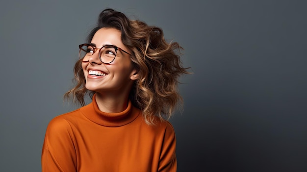 Happy woman posing in studio with solid background copy space available