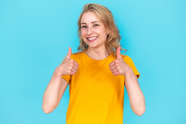 Happy woman showing thumbup gesture approve deal recommend offer