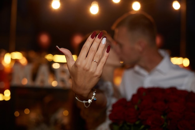 Happy Woman Shows Engagement Ring After Proposal